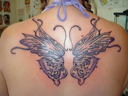 female back tattoo. full ack tattoos women.